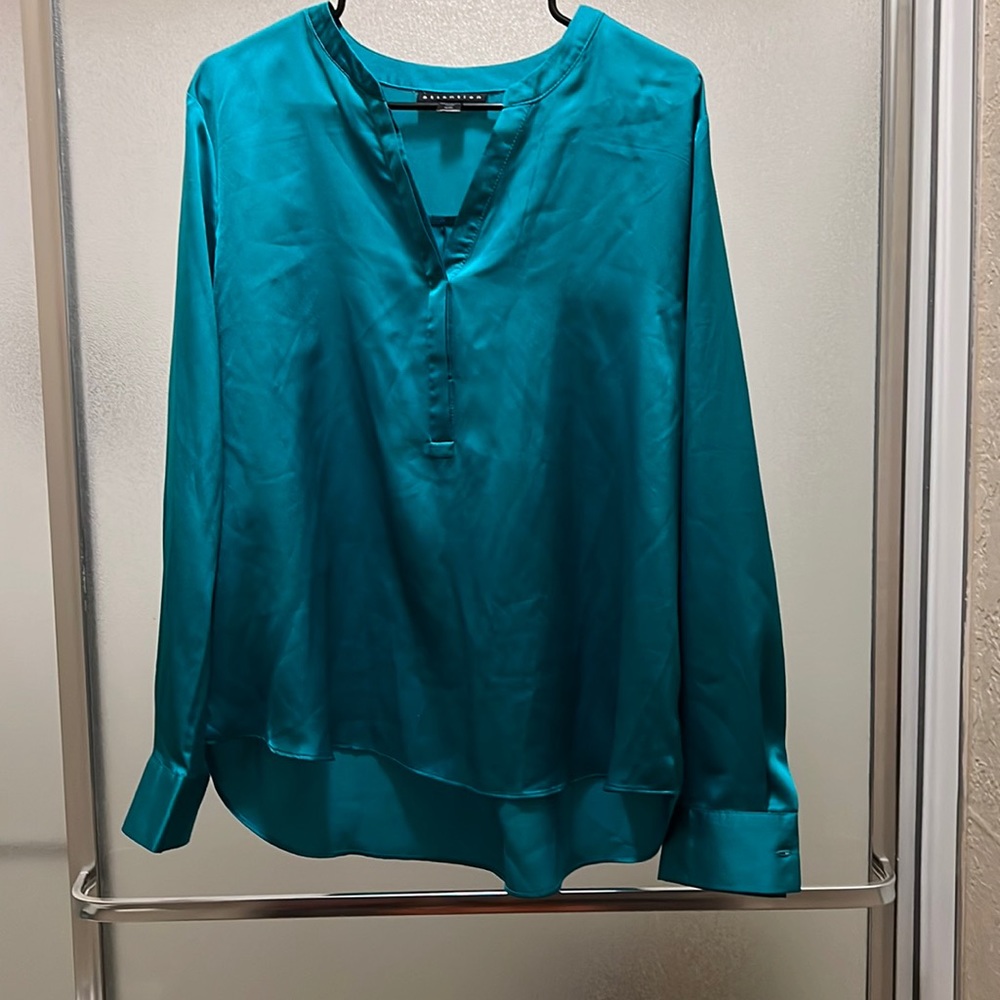 Xl size attention long sleeve blouse, it is on good condition color green blue.